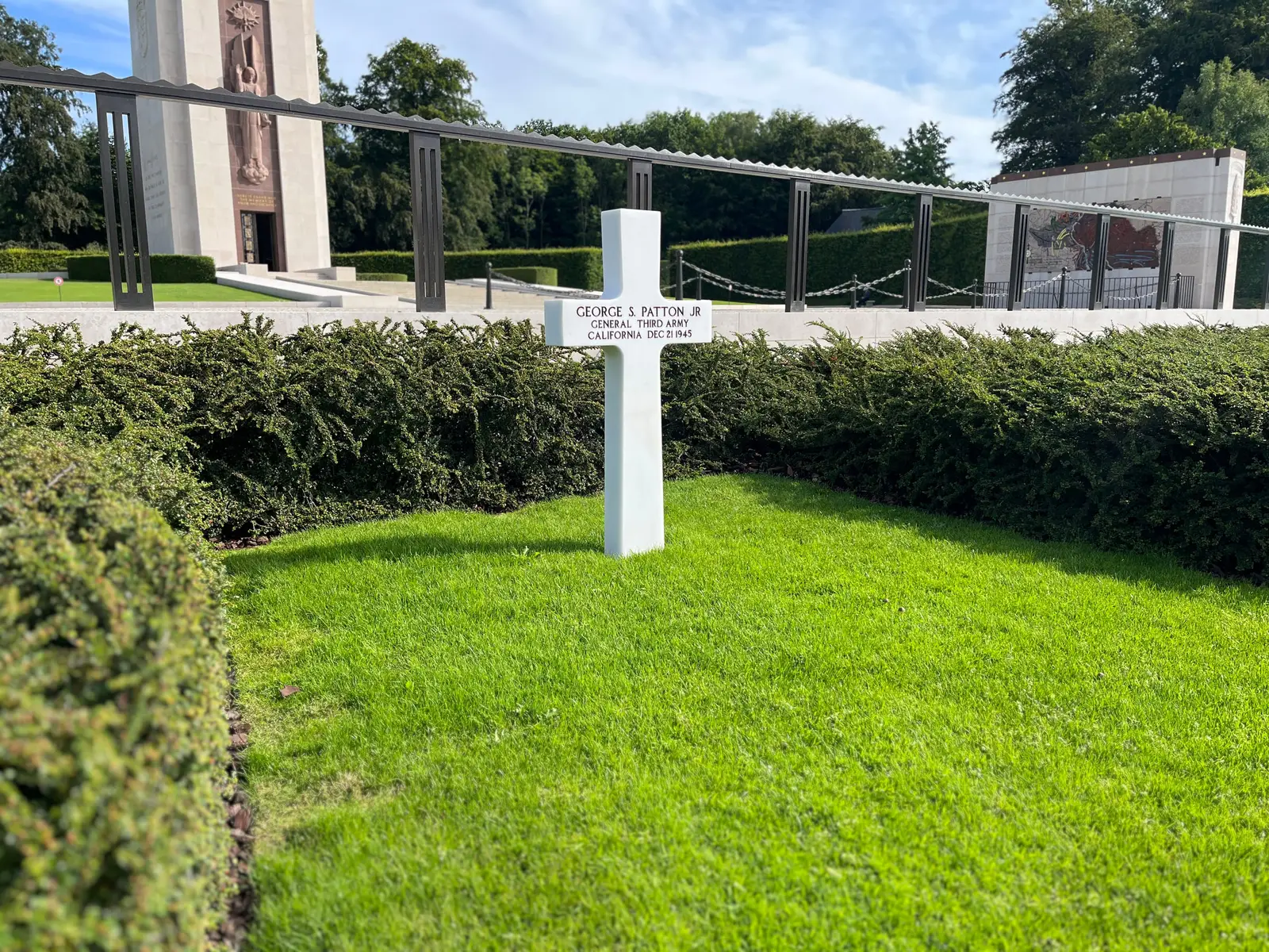 General Patton’s white marble cross standing alone at the head of the graves at the Luxembourg American Cemetery.